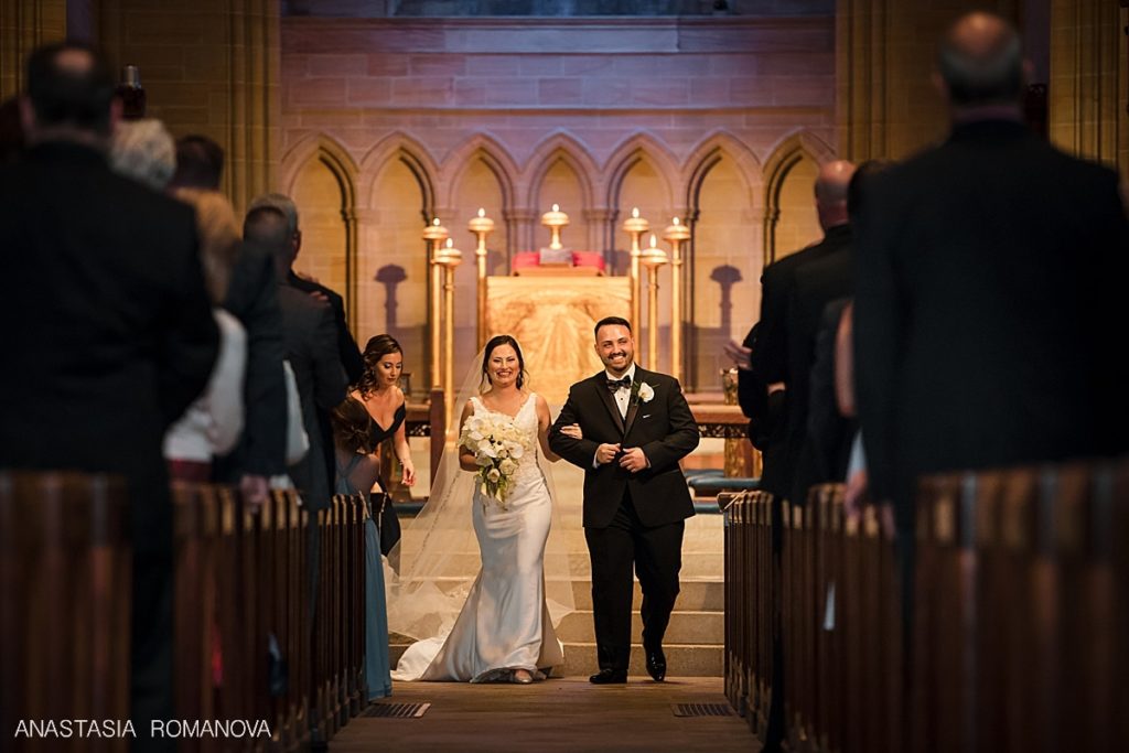 bride and groom walking down the aisle at Bryn Athyn cathedral  wedding ceremony