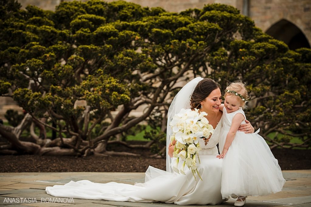 Bride with a flower girl at the Cairnwood Estate wedding