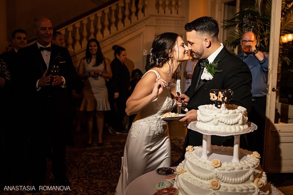 bride and groom are kissing after the cake cutting at Cairnwood Estate wedding