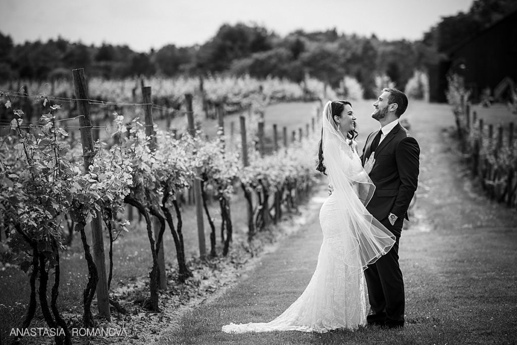 bride and groom romantic photo at crossing vineyards and winery