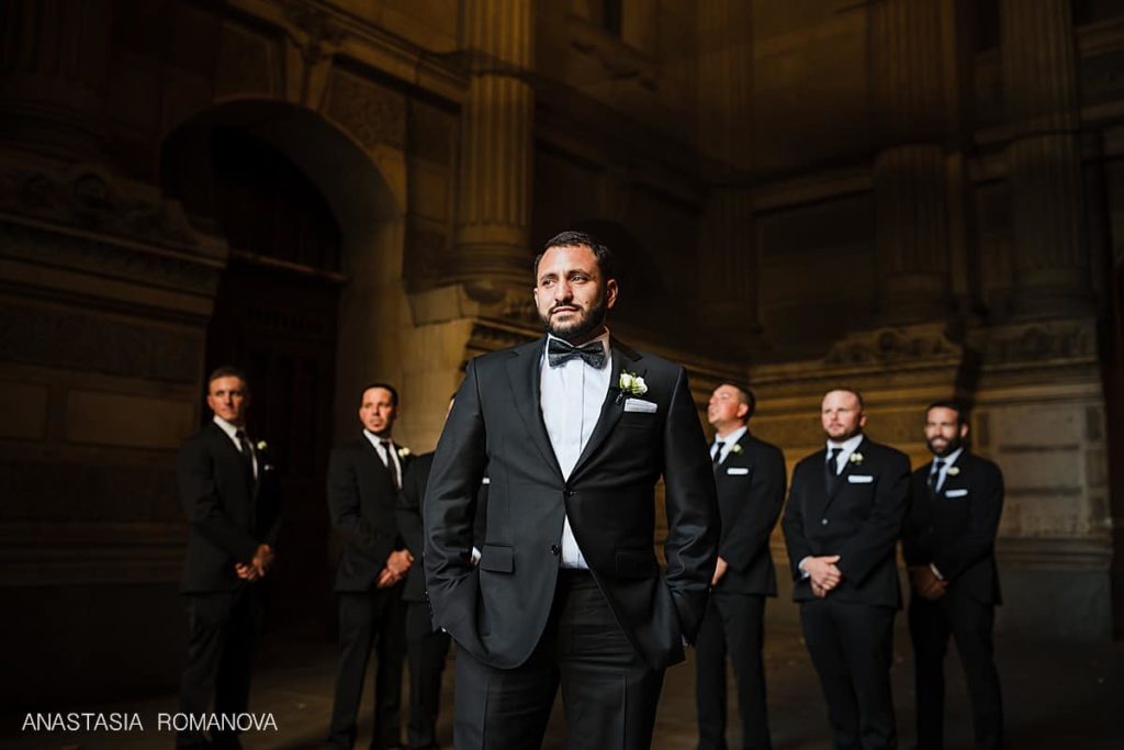 Dramatic photo of the groom at Philadelphia City Hall