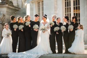 Black bridesmaids dresses with open backs for winter wedding in Philadelphia