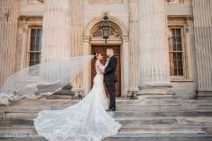 Wedding photo of the bride and groom at 1st National Bank in Philadelphia