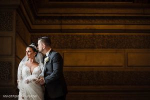 Philadelphia iconic wedding photo of the bride and groom at City Hall