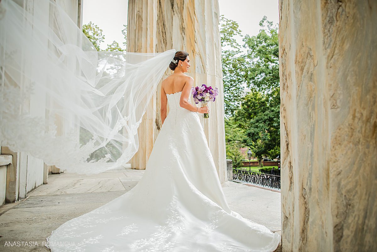 Dramatic veil photo of the Bride on the steps of 2nd National Bank in Philadelphia