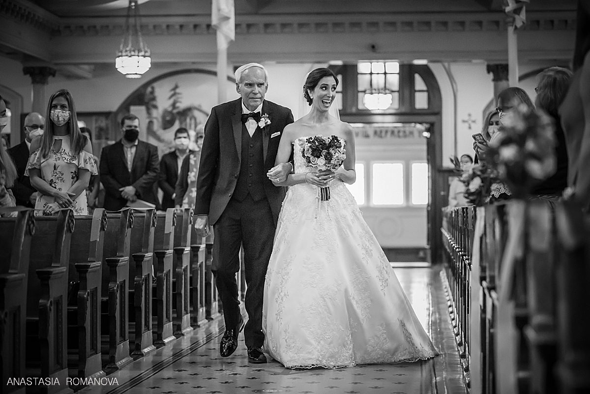 Bride walking down the aisle at St Augustine Church in Philadelphia