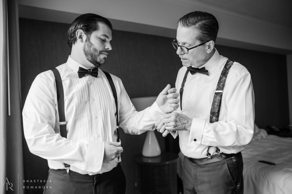 Groom getting ready with his father at Logan Hotel Philly