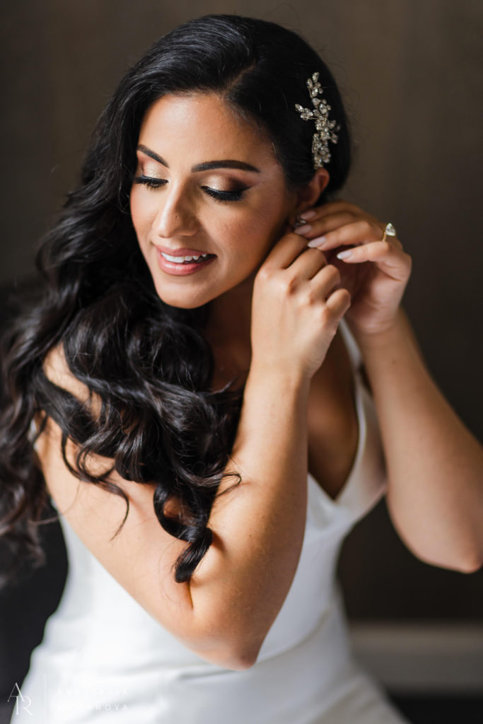 Stunning bride with long black hollywood hair getting ready at Logan Hotel Philadelphia