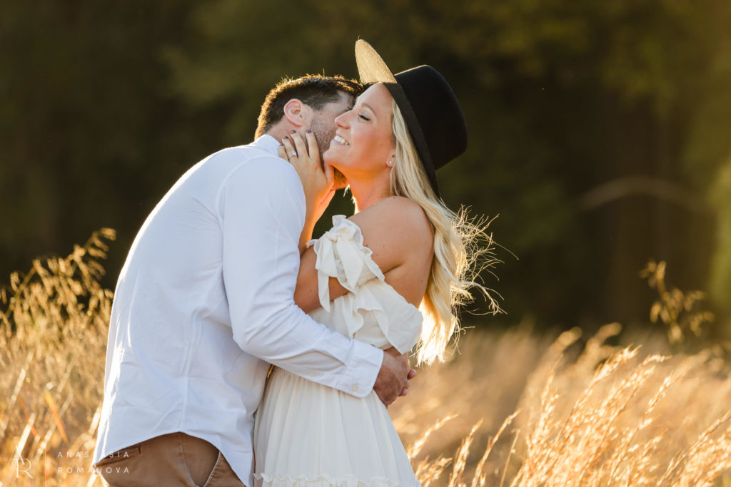 Couple kissing during their engagement session at Valley Forge